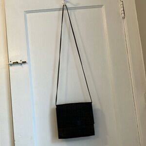 Hans Koch LTD SOHO New York, 100% textured leather, dark brown purse.